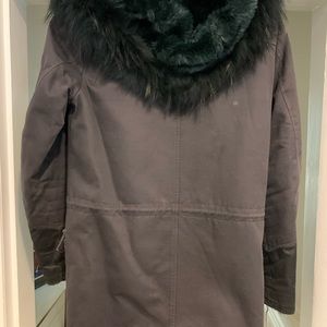 Navy blue and faux fur winter jacket